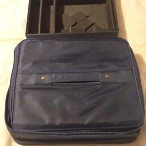Sturdy, 11 x 13, portable dark blue jewelry case with handle